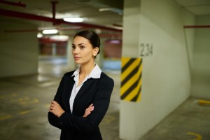 Businesswoman in underground car park