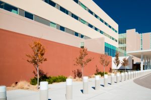 Sidewalk by Modern Building with Bollards